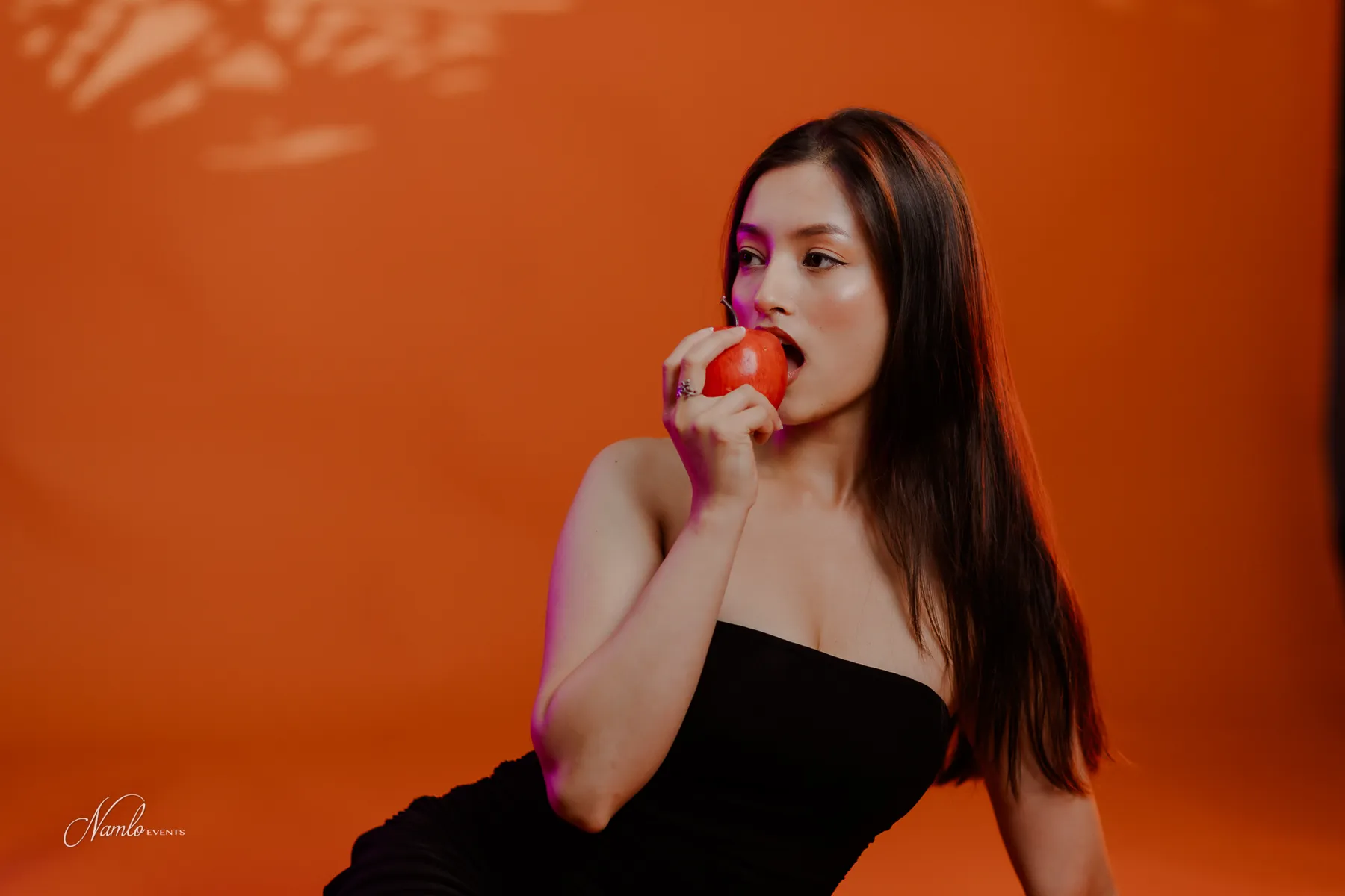 Portrait with a red apple